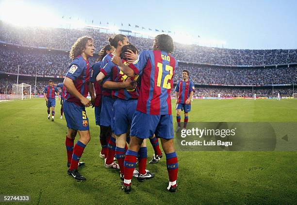Barcelona players celebrate Leo Messi's goal during the La Liga match between FC Barcelona and Albacete on May 1, 2005 at Camp Nou stadium in...