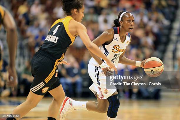 Allison Hightower, Connecticut Sun, drives past Skylar Diggins, Tulsa Shock, during the Connecticut Sun V Tulsa Shock WNBA regular game at Mohegan...