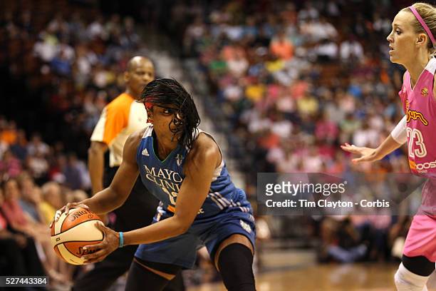 Monica Wright, , Minnesota Lynx, prepares to pass while defend by Katie Douglas, Connecticut Sun, during the Connecticut Sun Vs Minnesota Lynx, WNBA...