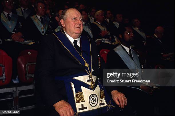 Freemasons in the audience at an event at Earls Court in London to promote their craft and public understanding. Freemasonry, which traces it's...