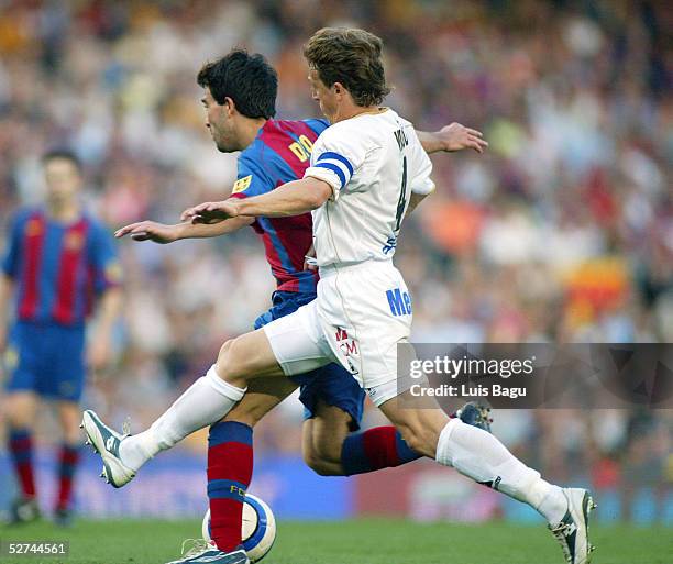 Deco of FC Barcelona and Laurent Viaud of Albacete in action during the La Liga match between FC Barcelona and Albacete on May 1, 2005 at Nou Camp...