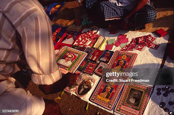 Stall selling Communist Party paraphenalia, with the face of EMS Namboodiripad former leader of Communist Party of India - CPI . Calicut, Kerala....