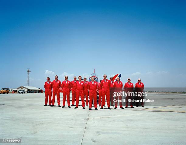 Official publicity portrait for the Red Arrows, Britain's RAF aerobatic team in mid-day glare at RAF Akrotiri. In the mid-day heat, all members of...