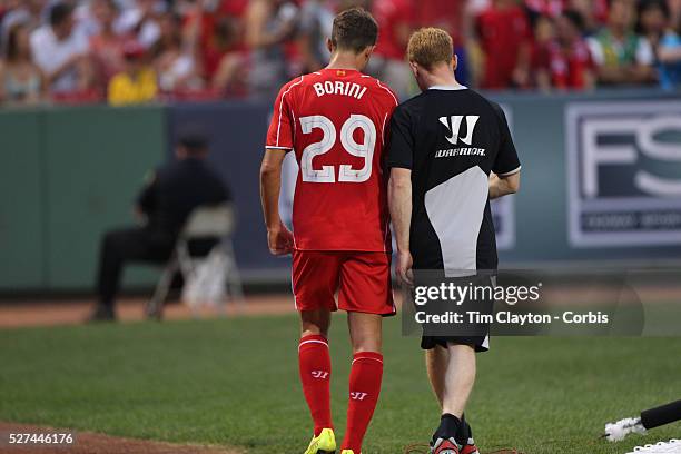 Fabio Borini, Liverpool, leaves the field injured during the Liverpool Vs AS Roma friendly pre season football match at Fenway Park, Boston. USA....