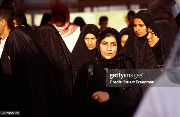 Female pilgrims attend the shrine in Karbala, Iraq. The shrine is holy to Shi'ite Muslims because it contains the tomb of Mashad al Hasayn bin Ali ,...
