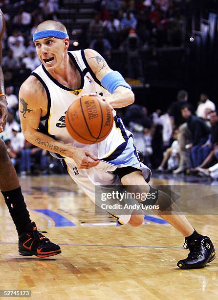 Jason Williams of the Memphis Grizzlies drive around Amare Stoudemire of the Phoenix Suns in Game four of the Western Conference Quarterfinals...