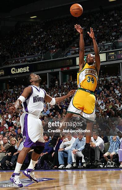 Ray Allen of the Seattle SuperSonics shoots over Cuttino Mobley of the Sacramento Kings in Game four of the Western Conference during the 2005 NBA...