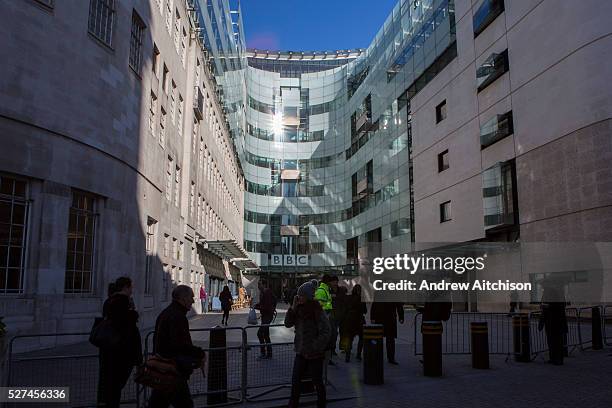 Peopel arriving at BBC broadcasting house. Central London, UK.