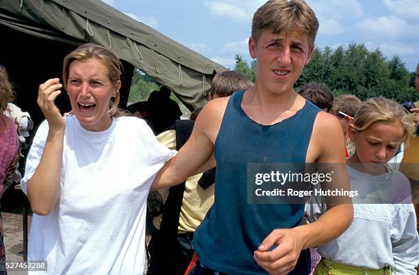 Refugees arriving in Tuzla after escaping from Srebrenica, where between 6000 and 7000 of their fellow moslems were murdered by Serbian forces