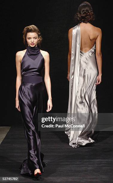 Miranda Kerr walks down the runway during the Jayson Brunsdon Collection show at the Cargo Hall in the Overseas Passenger Terminal during the...