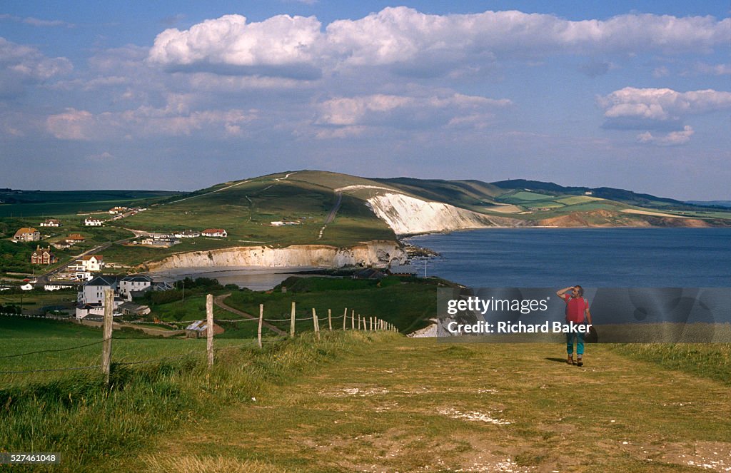 UK - Freshwater - Walker on coastal Tennyson Downs