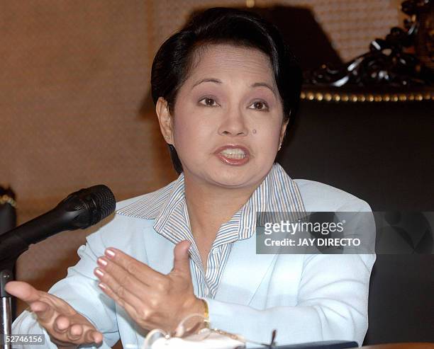 President Gloria Macapagal Arroyo speaks during a press briefing at Malacanang Palace in Manila, 02 May 2005, a day after Labor Day protests were...