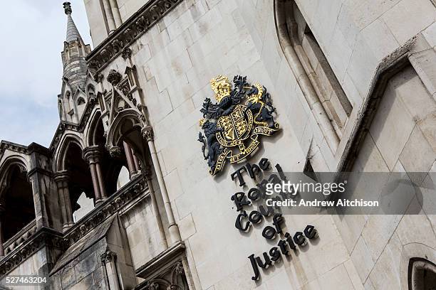 The sign outside The Royal Courts of Justice, commonly called the Law Courts, is a court building in London which houses both the High Court and...