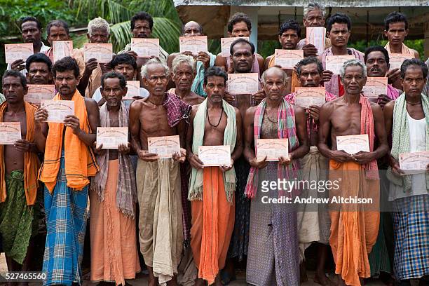 Local villagers with their newly acquired government work permits organized by CLAP. Committee for Legal Aid to Poor is a non-profit organisation...