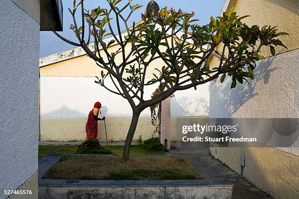 Govindhammal walks through the Tamaraikulum Elders village, Tamil Nadu, India