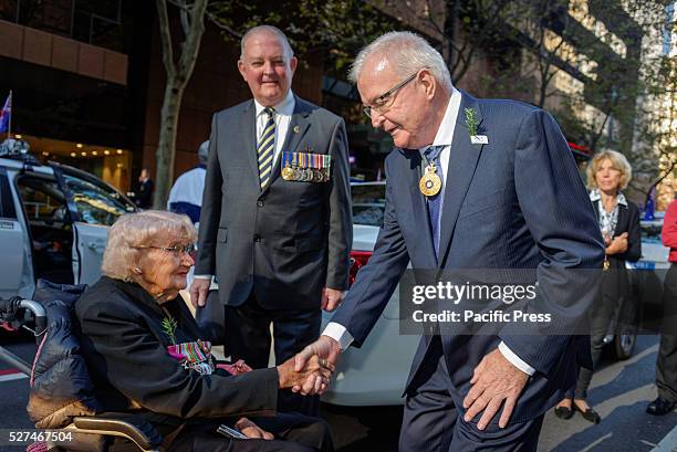 The Honourable T.F. Bathurst AC, Lieutenant-Governor of New South Wales greets Daphne Dunne, widow of Victoria Cross recipient Albert Chowne VC MM...