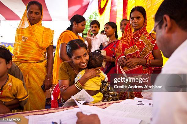 Families from the Dobhanda Nagar slum in Cuttack get legal advice and birth certificates from the Urban Law centre run by the organisation CLAP,...