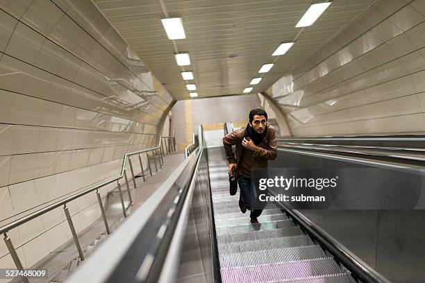 i'm so late - running up an escalator stock pictures, royalty-free photos & images