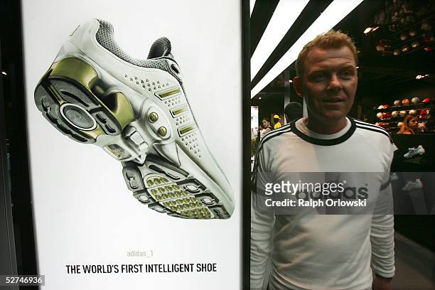 An advertisement for German sporting goods firm Adidas-Salomon stands on display May 2, 2005 in Frankfurt, Germany. Adidas-Salomon announced today...