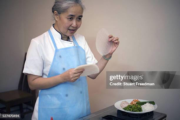 Cam Van, Vietnam's first television chef demonstrates how to make traditional Vietnamese dipping sauces at her restaurant, Doan Cam Van, Ho Chi Minh...