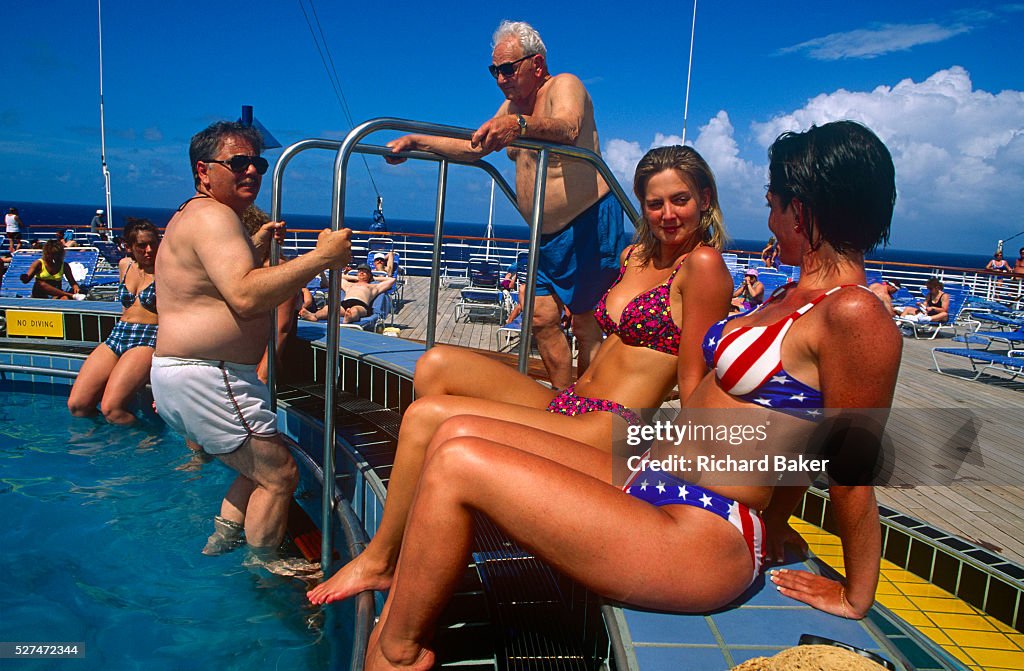 Mexico - Gulf of Mexico - Cruise ship girls flirt by pool