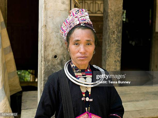 Portrait of a Ko Pala ethnic minority woman wearing her traditional clothing at Pak Nam Noi market, Phongsaly province, Lao PDR. One of the most...