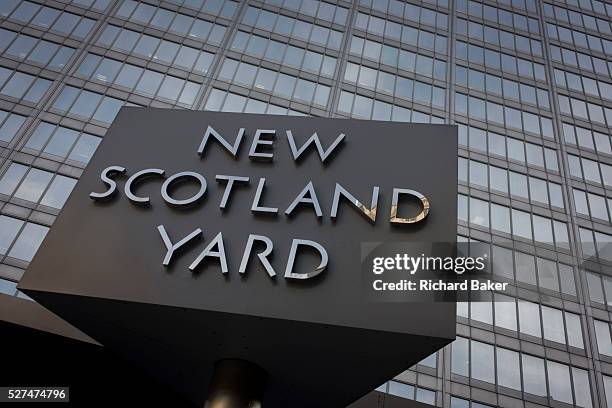 The Metropolitan Police's revolving sign their headquarters at New Scotland Yard in Westminster, London. Scotland Yard is a metonym for the...