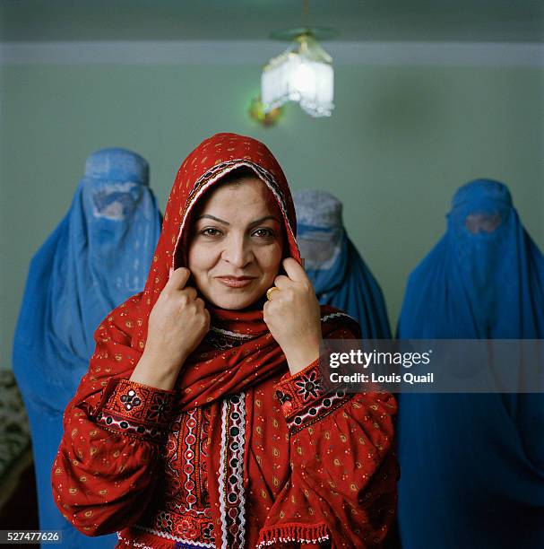 Qudriya Yazdan Parast is an elected MP in the Afghan Parliament. She is photographed at home with friends who prefer not to be identified for fear of...