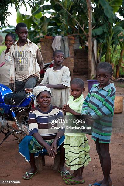 Bridjet Mbahiga with her children. She is mother of 4 and runs a subsistence plot of land to feed the kids yams, agash and rice. Benue state has got...