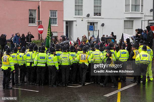 Police hold back black block who joined locals from Dover, Folkestone and Thanet today called a demonstration to welcome refugees into the UK via...