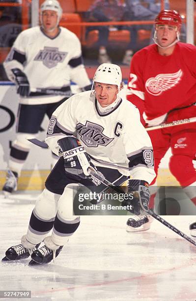 Canadian professional hockey player Wayne Gretzky of the Los Angeles Kings during a game against the Detroit Red Wings at the Western Forum,...