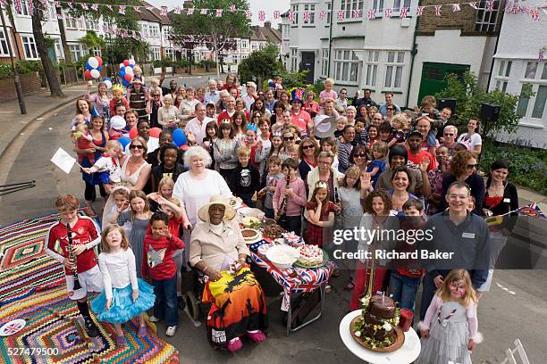 Neighbours and friends in Carver Road, Herne Hill south London, celebrate the royal wedding of Prince William and Kate Middleton . Across the UK 500...