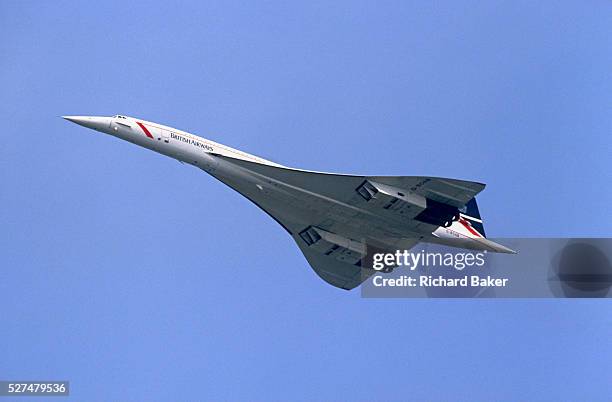 Concorde supersonic airliner registration G-BOAB flies overhead during its service for British Airways - en-route for a foreign destination. The...