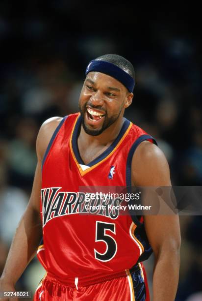 Baron Davis of the Golden State Warriors enjoys a moment during the game against the Houston Rockets on April 5, 2005 at The Arena in Oakland in...