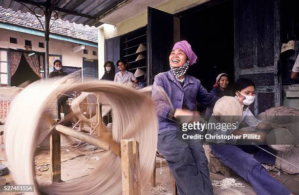 Weaving wool in a small family run cooperative, Hue city, Vietnam | Location: HUE CITY, Vietnam.