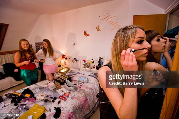 Four girls getting ready for an 18th birtday party for Julia Cummings and Rebecca Stone in the bedroom of Julia's sister Katy. The girls names are...