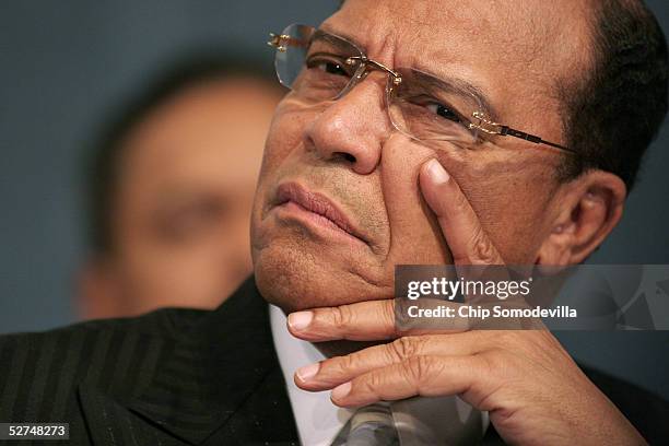 Minister Louis Farrakhan, leader of the Nation of Islam, listens to the comments of other national civic, political and religious leaders during a...