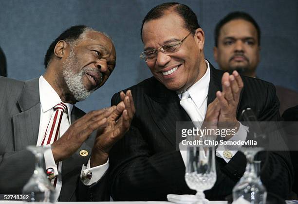 Former Washington, DC Mayor Marion Barry , a current DC Council member, talks to Minister Louis Farrakhan , leader of the Nation of Islam, during a...