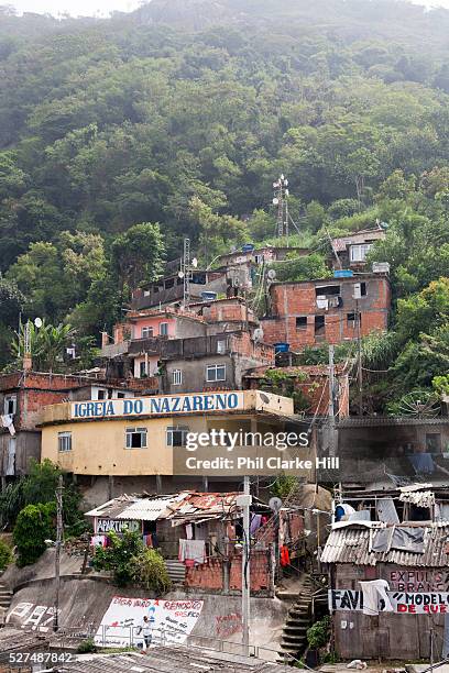 Makeshift evangelical church at the top of favela Santa Marta in Botafogo on a misty day, Rio de Janeiro.