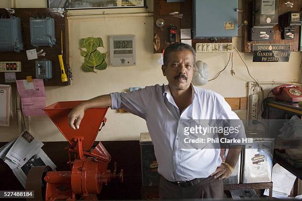 Portrait of the owner of Ganesh coffee, Madikeri. Coorg or Kadagu is the largest coffee growing region of India, in the state of Karnataka, the...