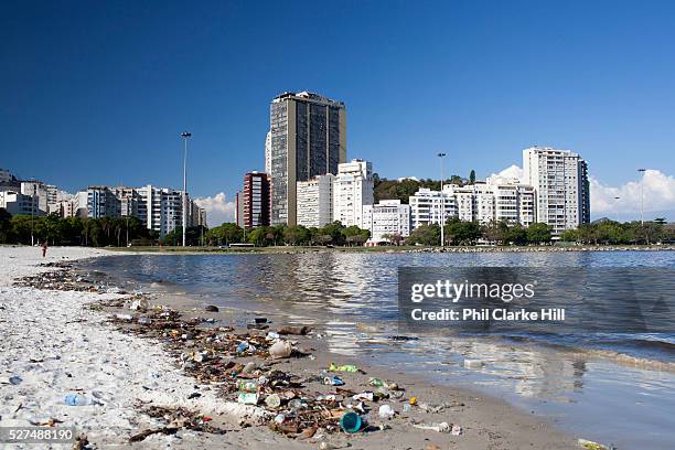 Rubbish litter pollution on Botafogo beach near the marina, Rio de Janeiro, Brazil.