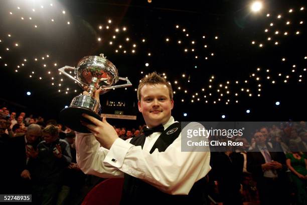Shaun Murphy holds the trophy after winning the Embassy World Snooker Final against Matthew Stevens at the Crucible Theatre on May 2, 2005 in...