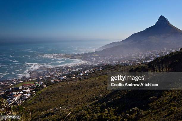 View of Camps Bay and Lions head from Table Mountain, Cape Town, South Africa. Camps Bay is an affluent suburb of South Africa and attracts many...