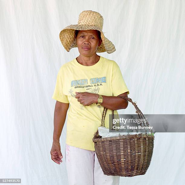 Myrna Layaog , fish saleswoman, Pooc, Bantayan Island, The Philippines. Every morning at 7 am fisherwomen meet fishermen as they return from the sea...