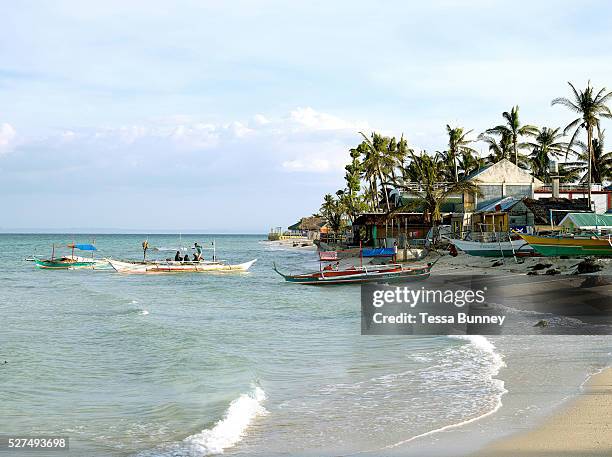 Fishing boats preparing to go out fishing, Talisay, Santa Fe, Bantayan Island, The Philippines. On November 6 2013 Typhoon Haiyan hit the Philippines...