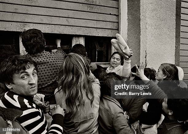 Bread queues, Tirana. Albania's communist economic system, with its strict central controls, egalitarian incentive system, and bias toward heavy...