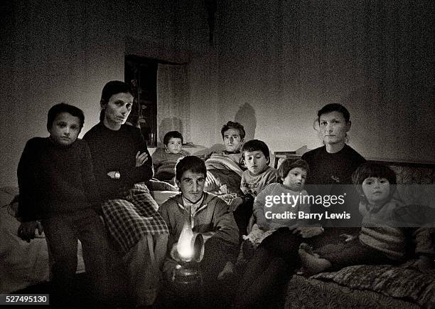 The familly of Murat Balia who was killed ina blood feud with the familly of Amathj Mehmed. His nephew, Myftar Balia, is lying in the bed with the...