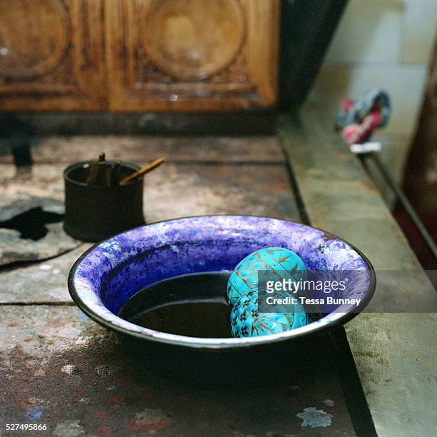 Dyeing painted eggs, Hurghis, Bucovina, Romania. In Christian Orthodox countries such as Romania there is a tradition of skilfully painting eggs...