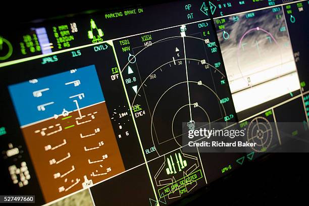 Glowing cockpit instrumentation of a Lockheed Martin F-35 Lightning II stealth fighter. The F-35 Lightning II is a fifth-generation, single-seat,...