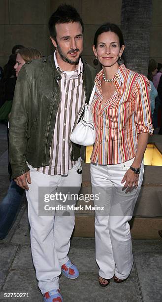 Actors Courteney Cox-Arquette and husband David Arquette attend the "Premiere of Sony Classics Layer Cake" at the Egyptian Theatre on May 2, 2005 in...